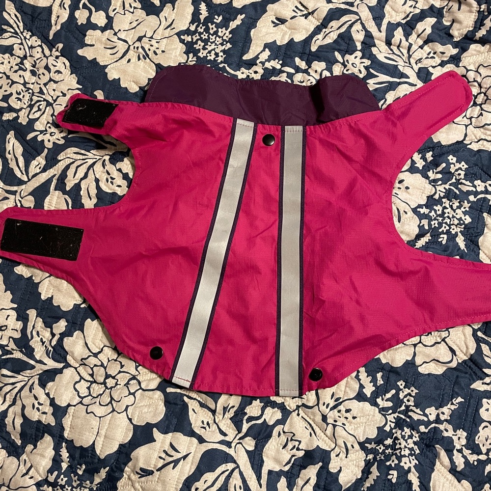 2 in 1 dog jacket.  Outer layer like rain jacket with removable fleece inner.